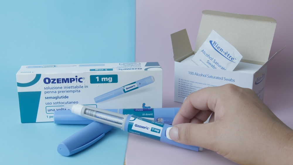 Woman holding Ozempic Injection