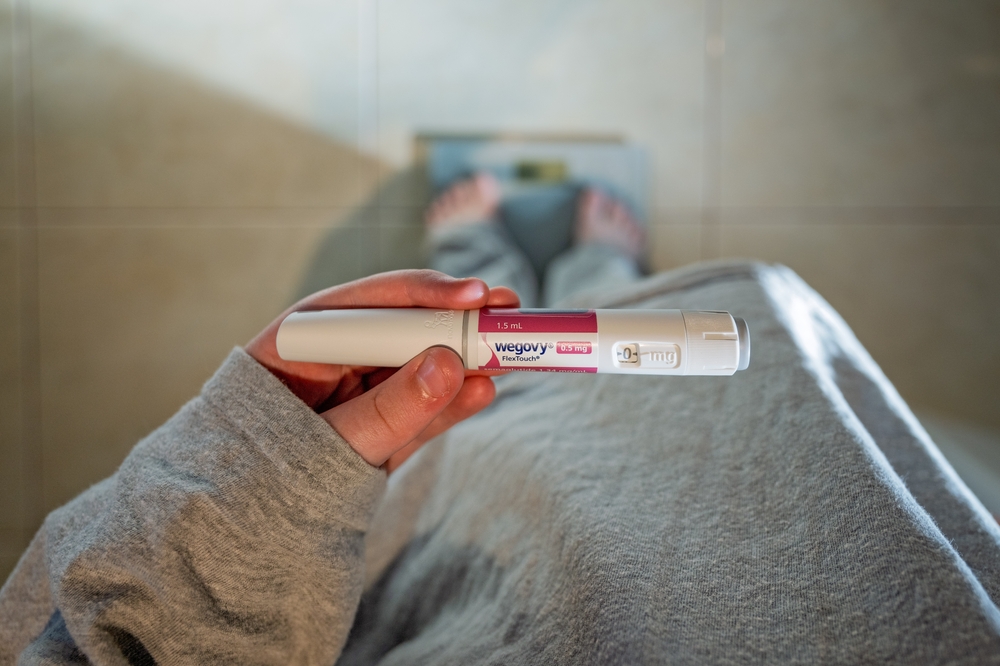 Woman holding Wegovy